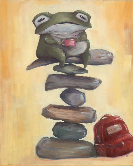 Frog sitting on stacked stones with a red backpack in the corner on a beige background