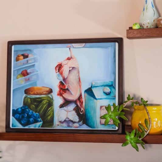 2 GUINEA PIGS IN A FRIDGE, ONE IS REACHING FOR THE ICE CREAM. THIS IS A FRAMED PRINT EXAMPLE OF 11X14" SIZE.
