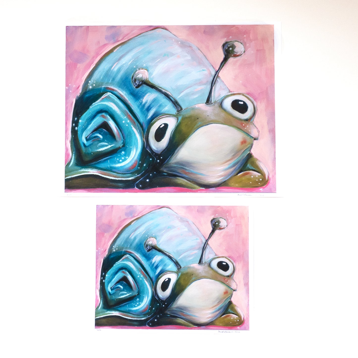 COLORFUL snail/frog combo animal with a pink background, comparing the size difference between an 11x14 and 8x10