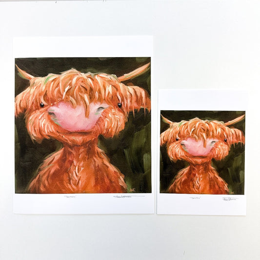 size comparison between the two offered print sizes of the Highland cow, Duncan.