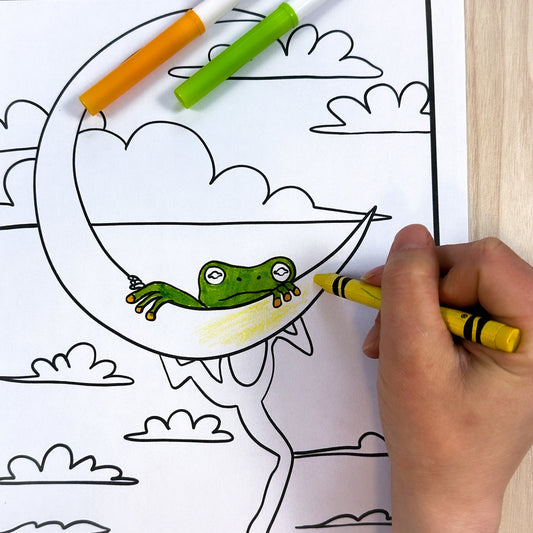 Coloring page of a tree frog hanging from a crescent moon. There are big fluffy clouds in the sky around it. Some of the page is colored in.