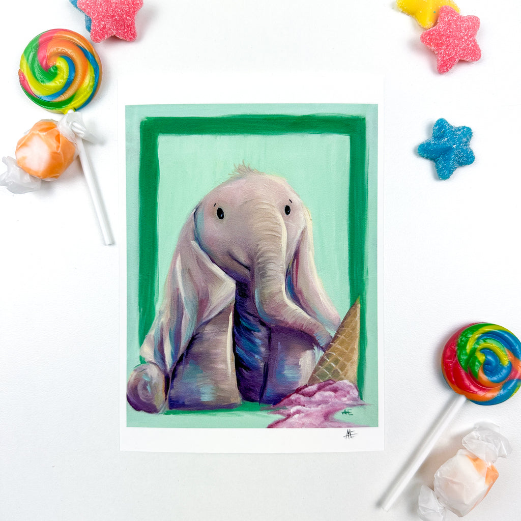 5x7 print of the Elephant with long floppy ears laying over his legs with an upside down ice cream cone in the foreground that has melting pink colored ice cream coming from it.
