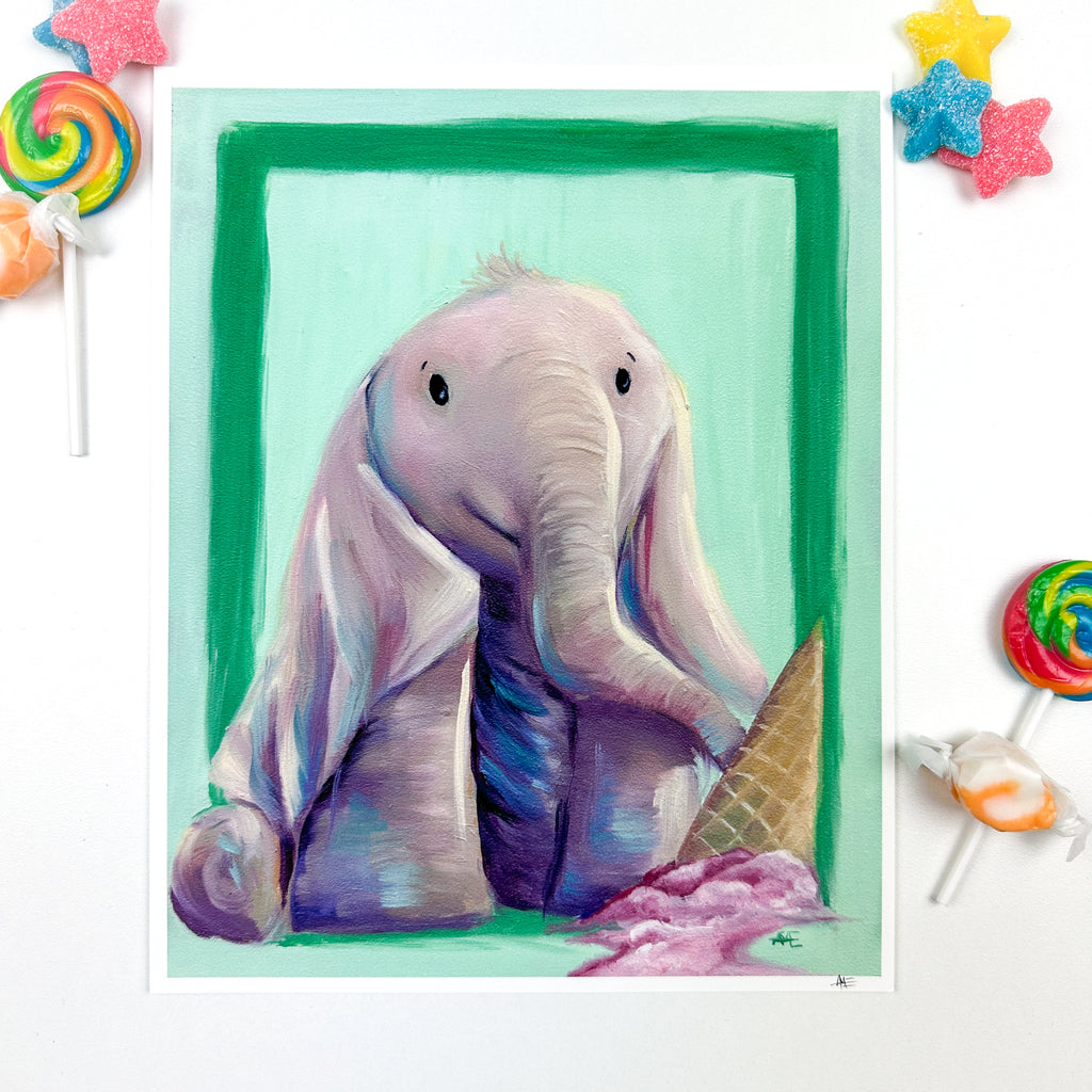 8x10  print of the Elephant with long floppy ears laying over his legs with an upside down ice cream cone in the foreground that has melting pink colored ice cream coming from it