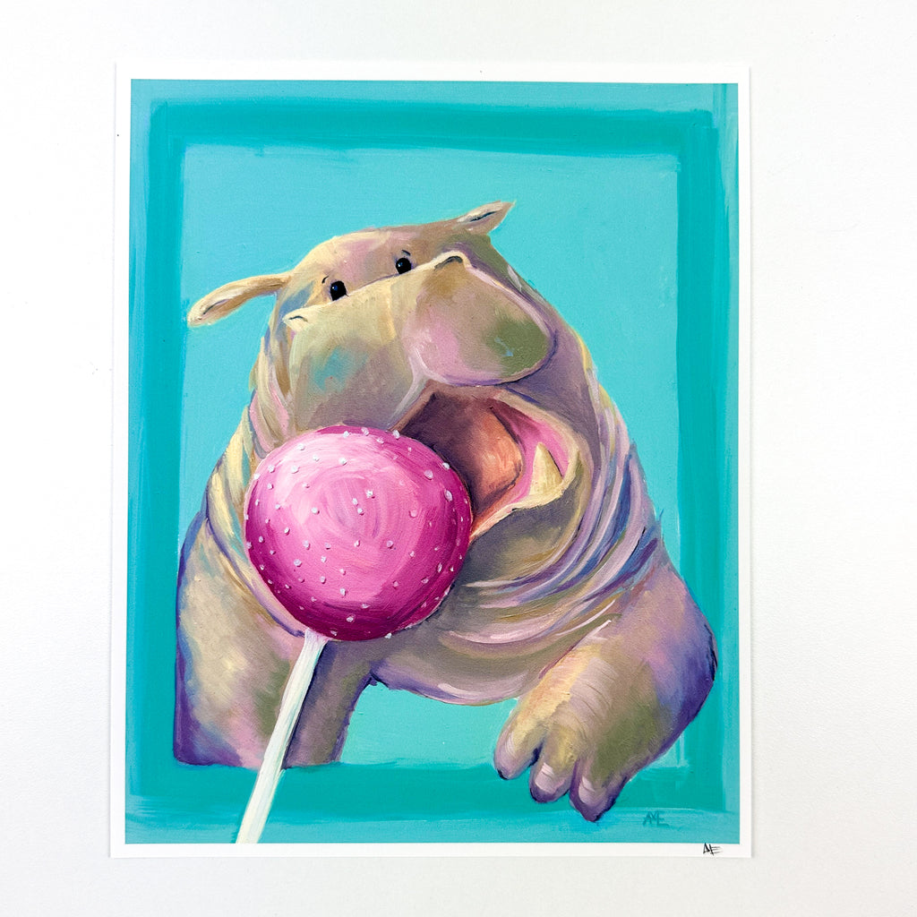 fine art print of cute kawaii style hippo busting out of a border and open mouth going after a pink cake pop