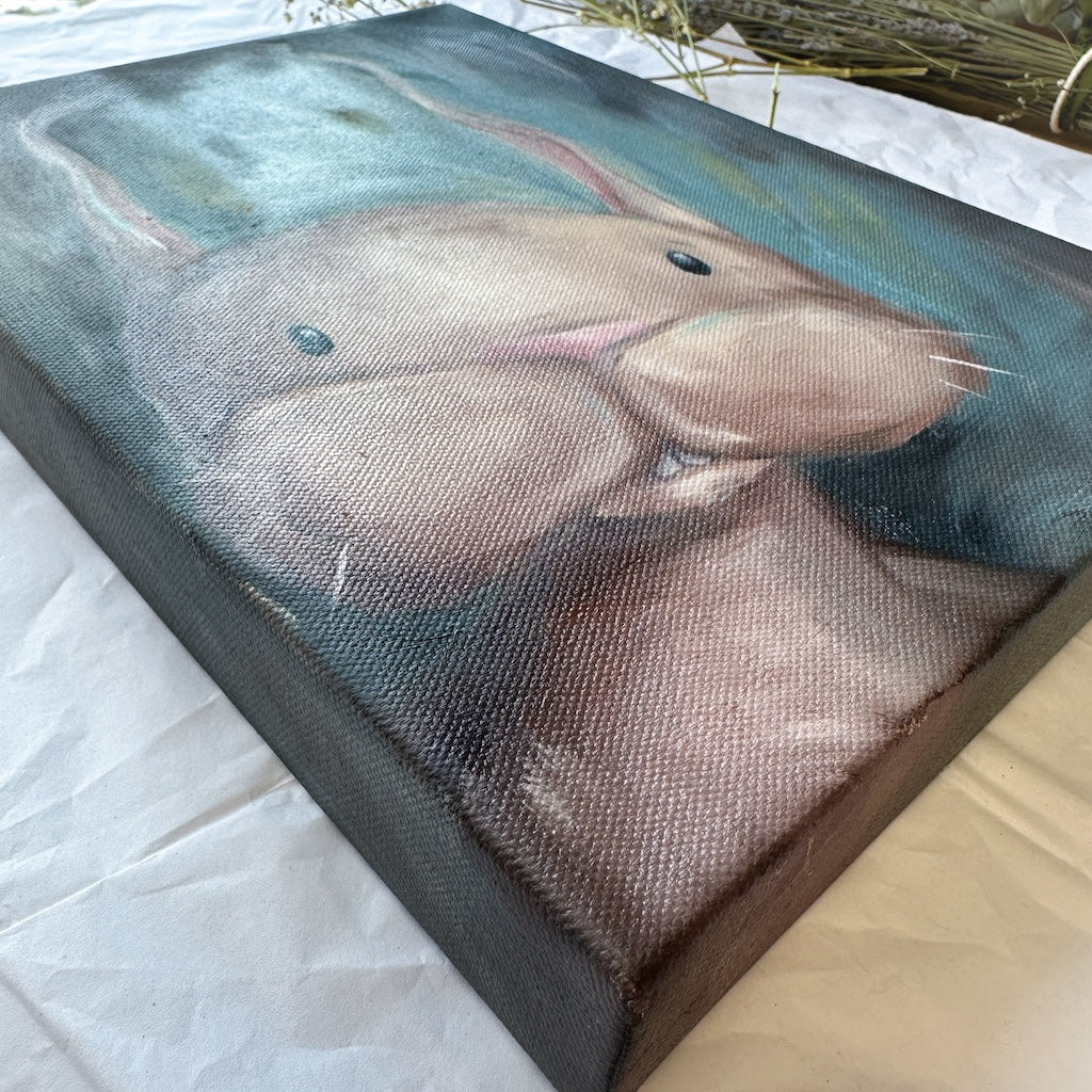 angled view of the brown bunny. This view shows the depth of the canvas and the painted sides.