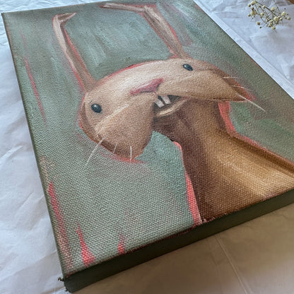 angled view of the bunny which shows some of the depth of the canvas. 