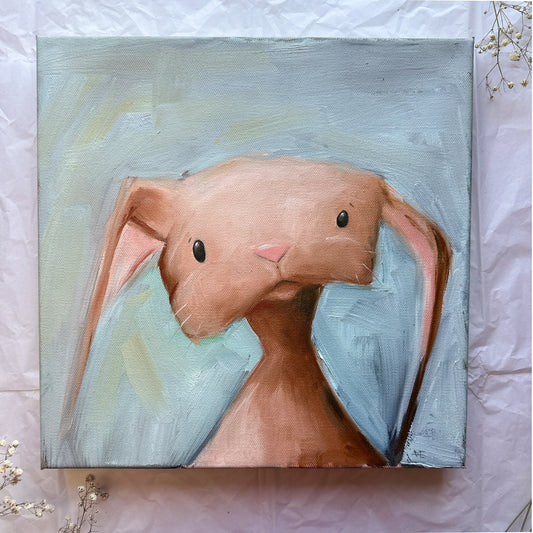 oil painting of a brown bunny with downward ears and a light blue background. 