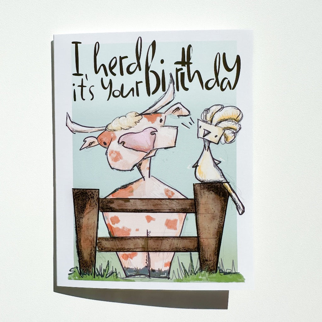 illustration of a cow and a cockatoo talking to it. The title reads "I herd it's your birthday"