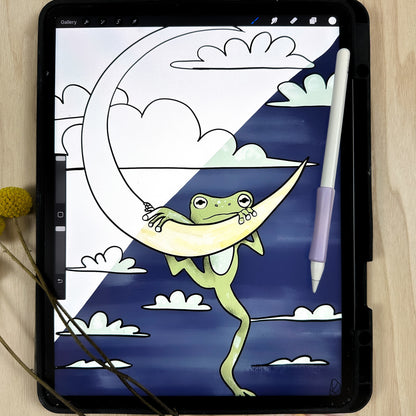 iPad with app procreate open and showing the digital coloring page of the frog hanging on the moon.  Half of it is colored in. 