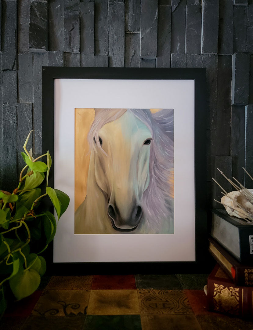 The colorful horse print is framed in a black frame with a white matte.